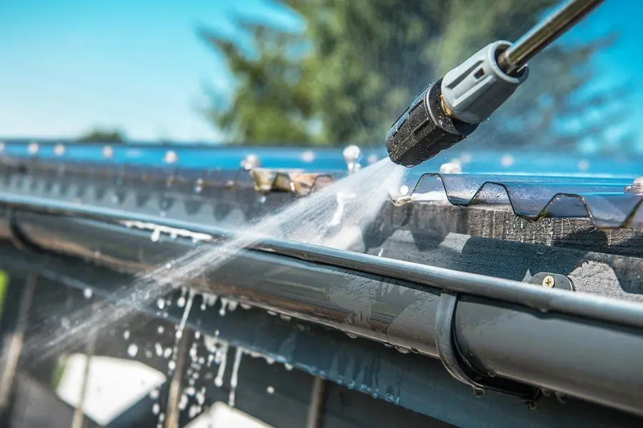 Removing compacted leaves from a gutter channel